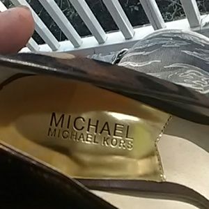 The finest in fashion gold tip cow hide Michael